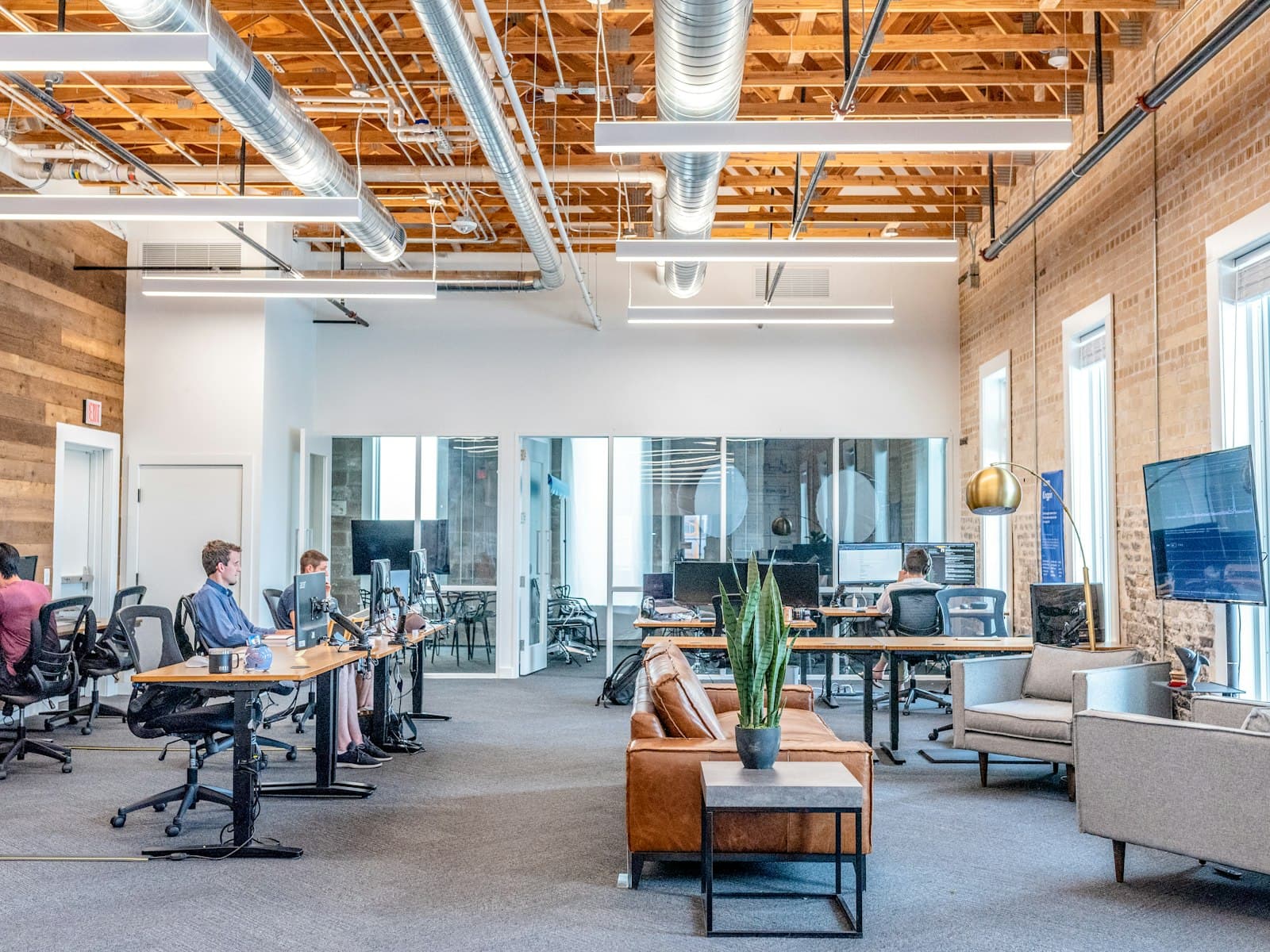 Advisors talking at a work table